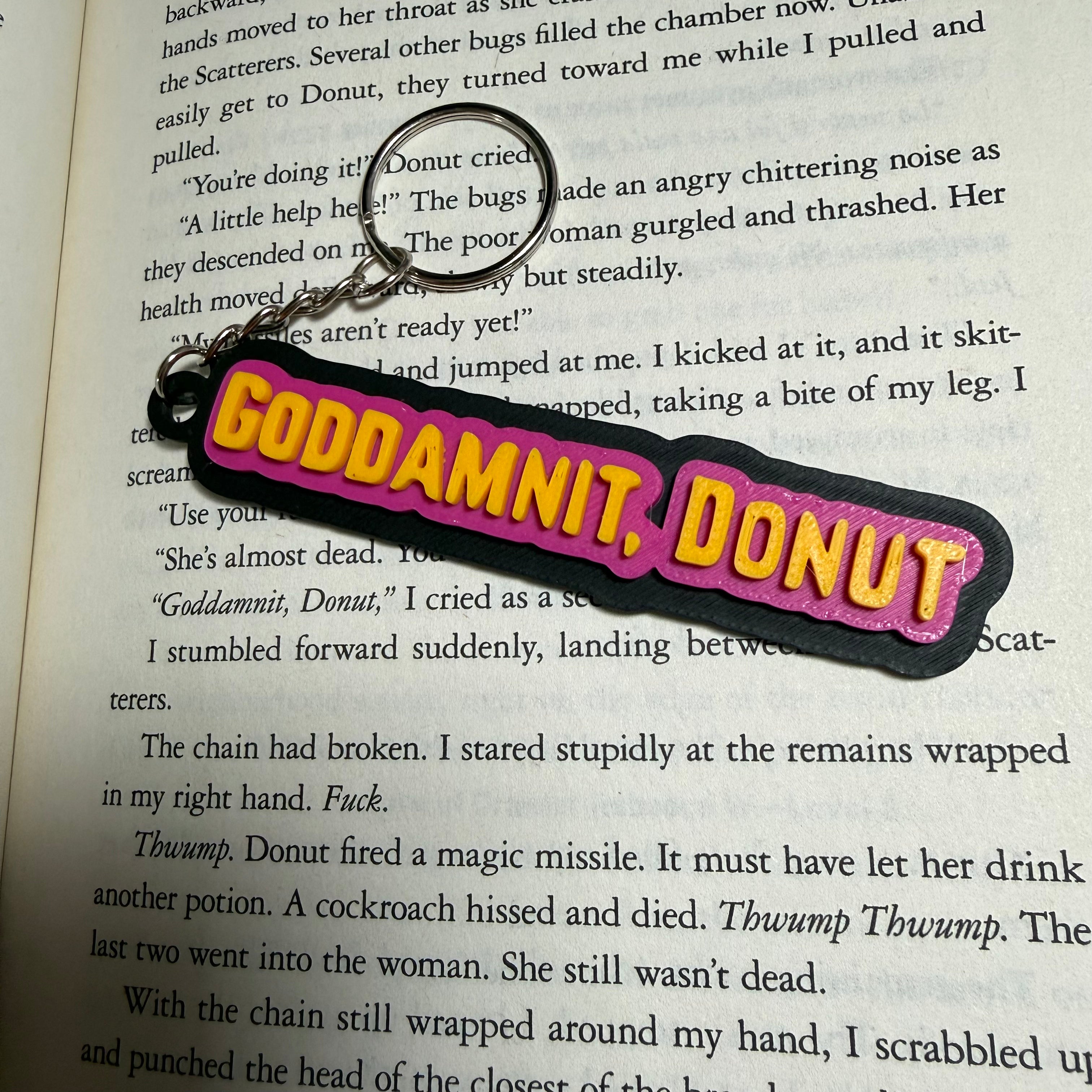 "Goddamnit, Donut" DCC Inspired Keychain | Dungeon Crawler Carl Fan Gift | 3D Printed RPG Accessory | Funny Fantasy Reader Keychain