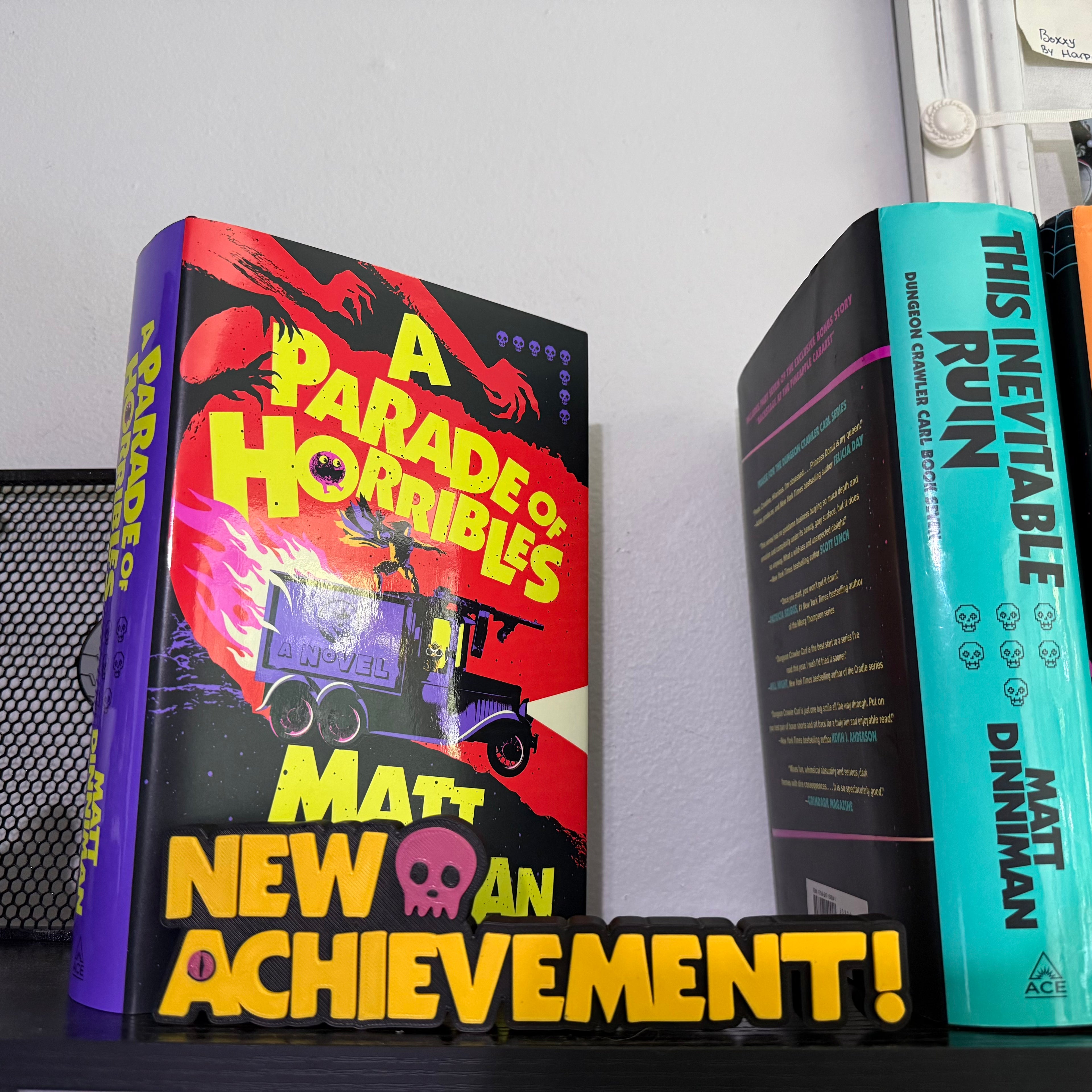 Dungeon Crawler Carl Inspired “New Achievement!” Shelf Display