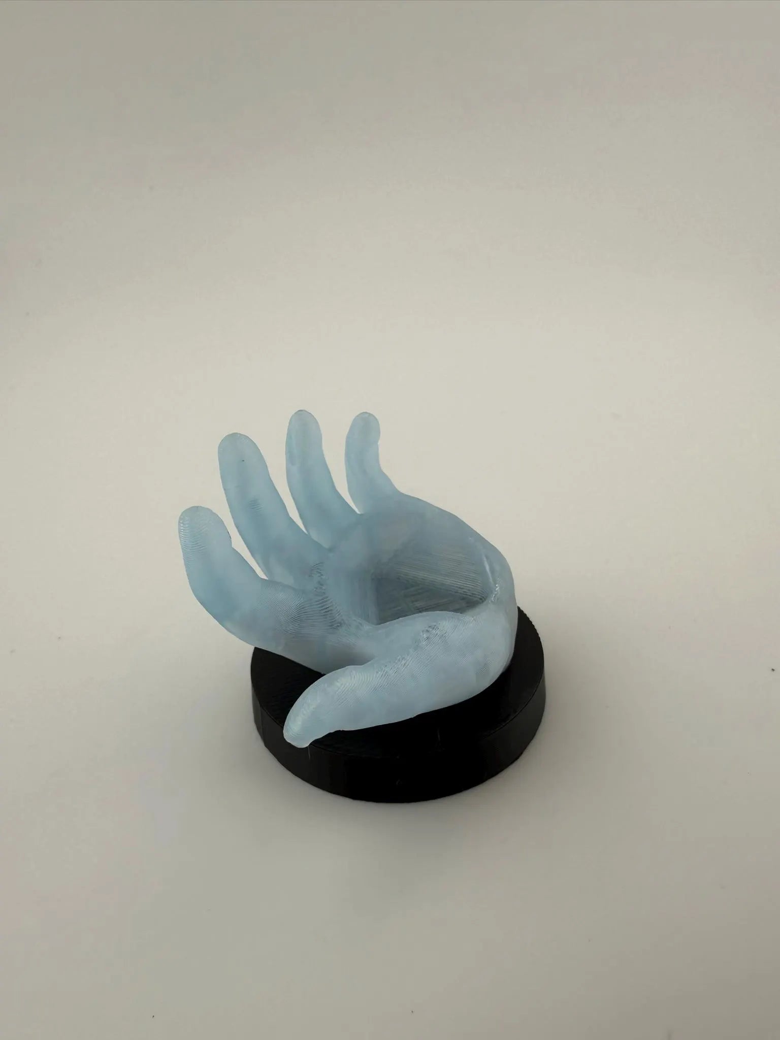 Four Fantastic Dice Holder Hands inspired by the new Magic X Marvel Crossover